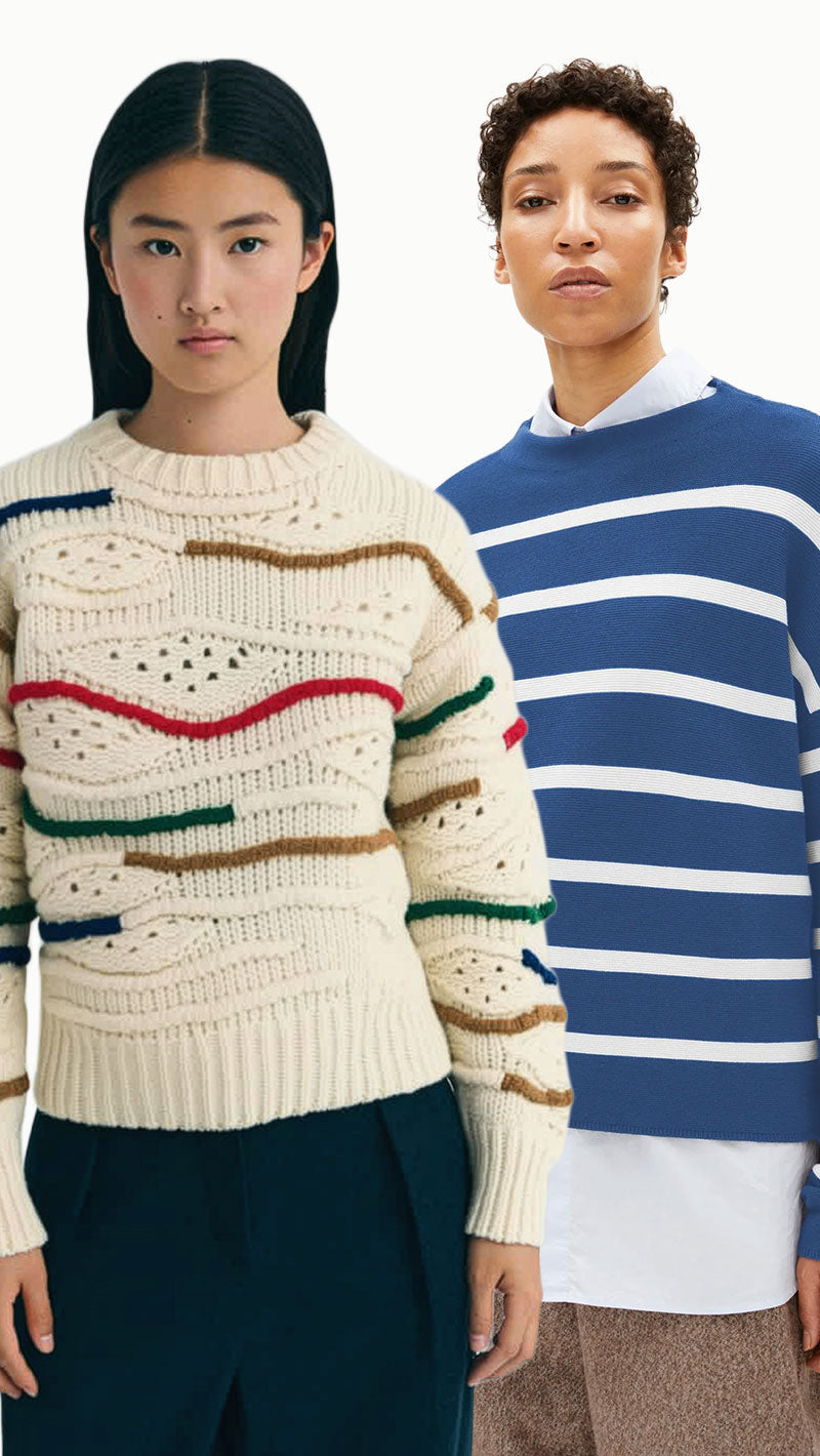Two people wearing patterned sweaters against a white background